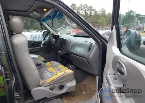 2001 Ford F-150 King Ranch Edition/Lariat/Xlt z USA, uszkodzony, nr VIN 1FTRW08L61KA21736